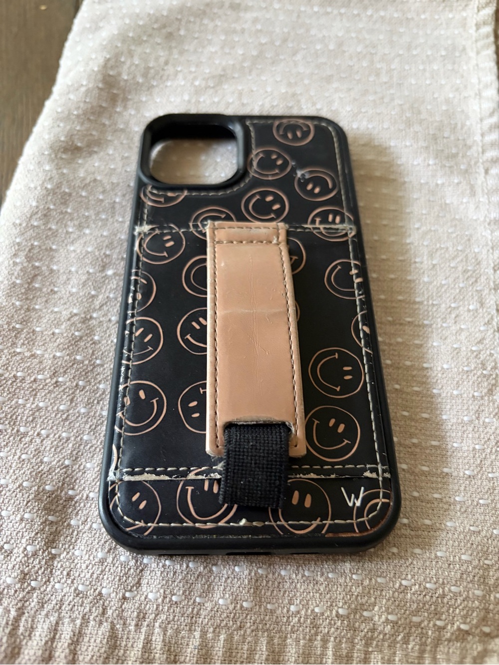 Black Smiley Pattern Phone Case with Beige Strap